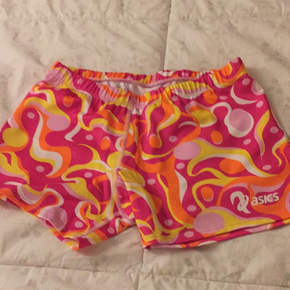 Pink patterned retro athletic shorts.